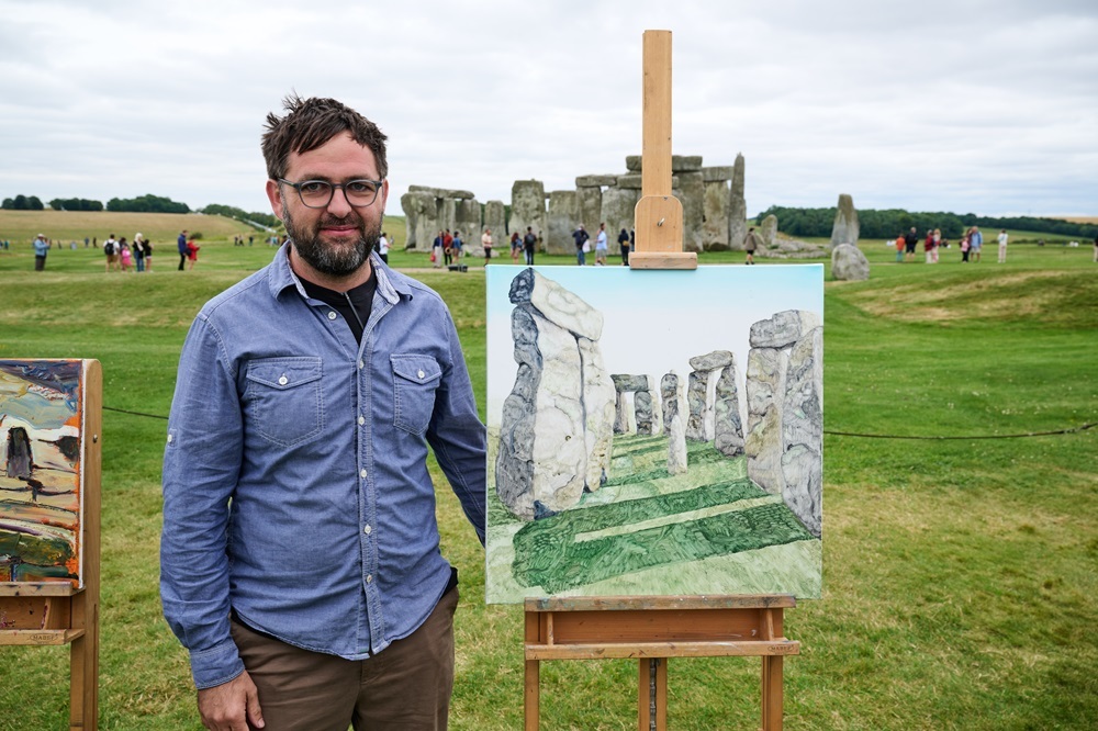 Ben MacGregor with his work at Stonehenge